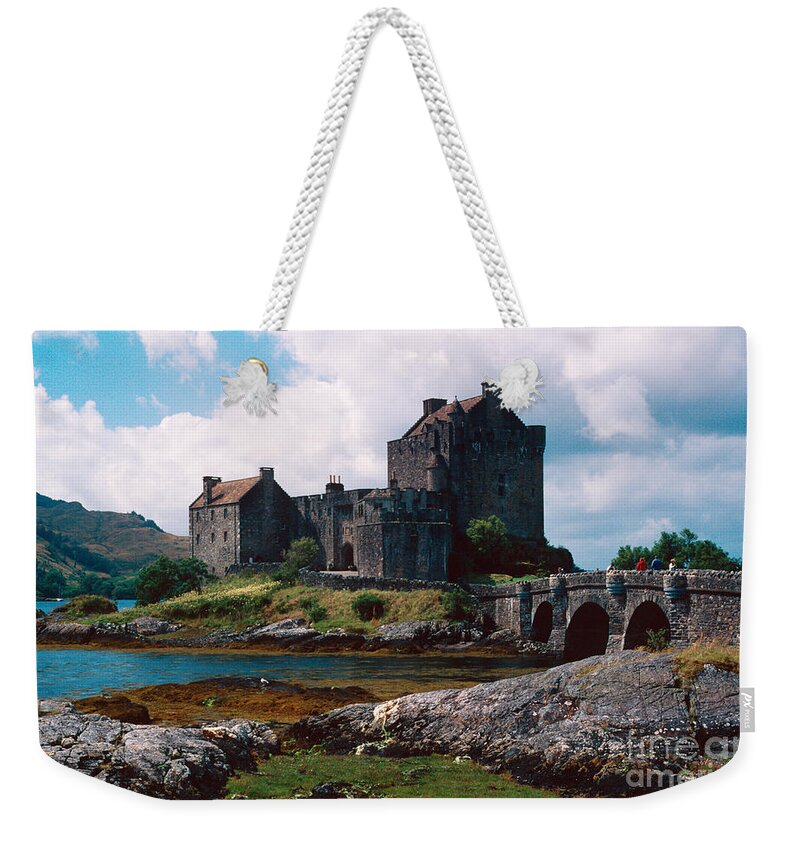 Eilean Weekender Tote Bag featuring the photograph Eilean Donan castle #1 by Riccardo Mottola