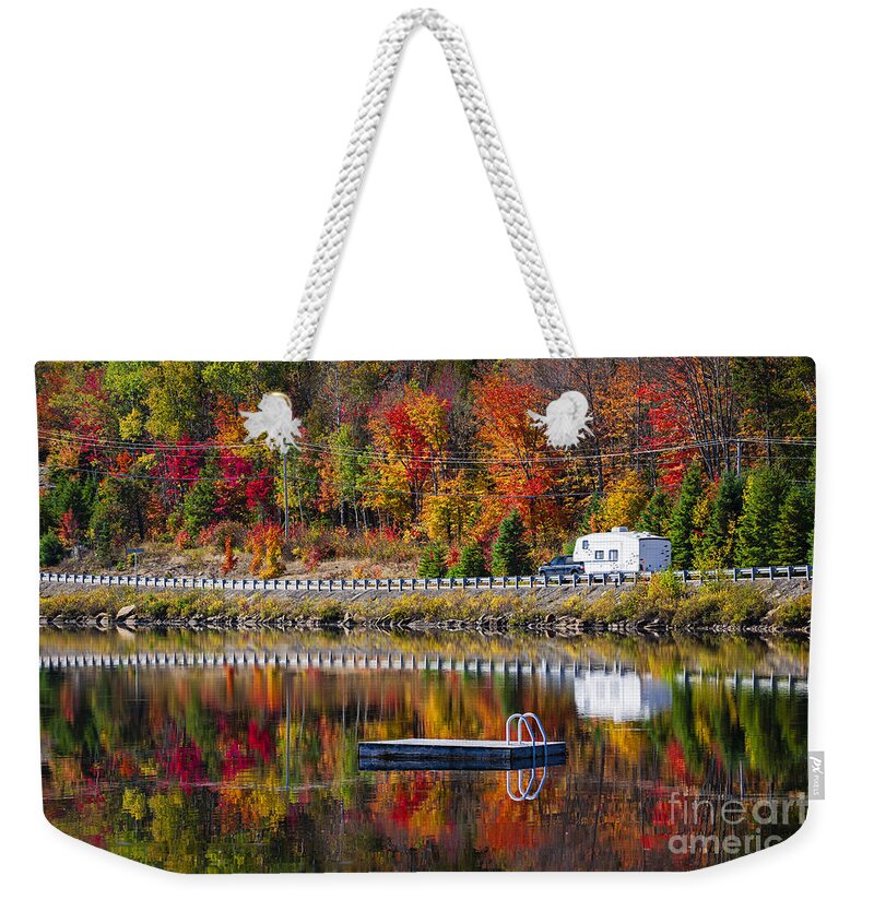 Forest Weekender Tote Bag featuring the photograph Highway through fall forest 3 by Elena Elisseeva