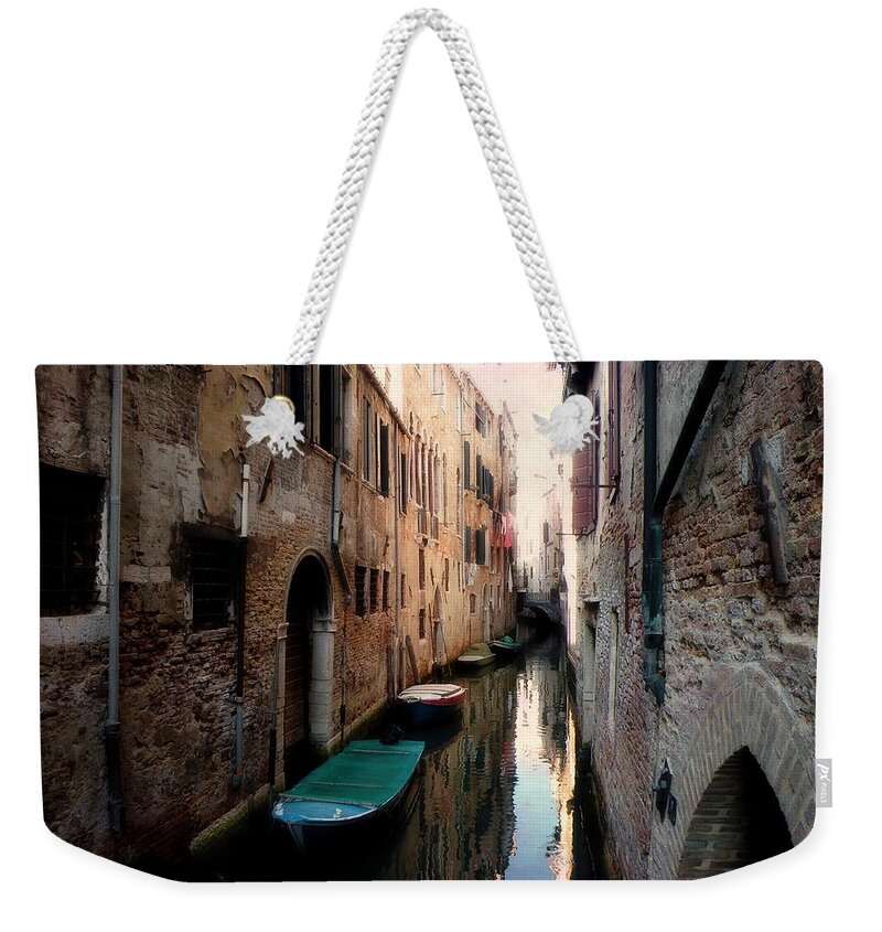 L'aqua Magica Weekender Tote Bag featuring the photograph L'Aqua Magica #1 by Micki Findlay