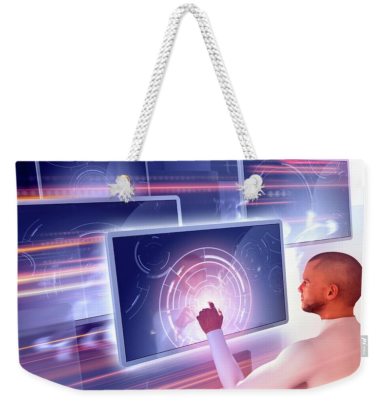 Abundance Weekender Tote Bag featuring the photograph Man Using Touch Screen Technology #1 by Ikon Ikon Images