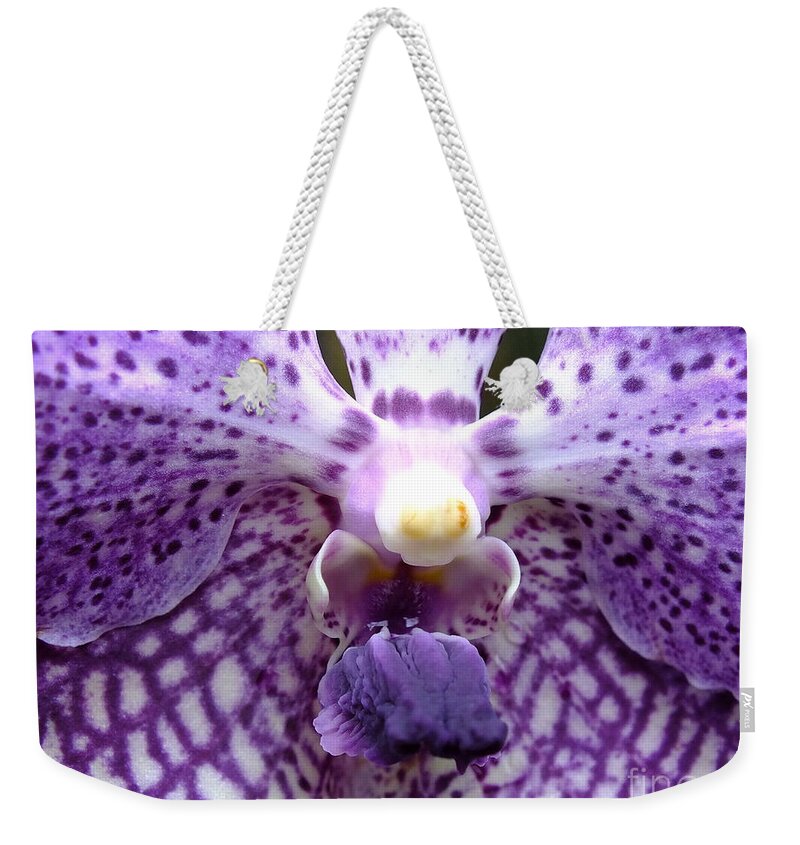 Micro Pictures Weekender Tote Bag featuring the photograph Micro Orchid #1 by Yenni Harrison