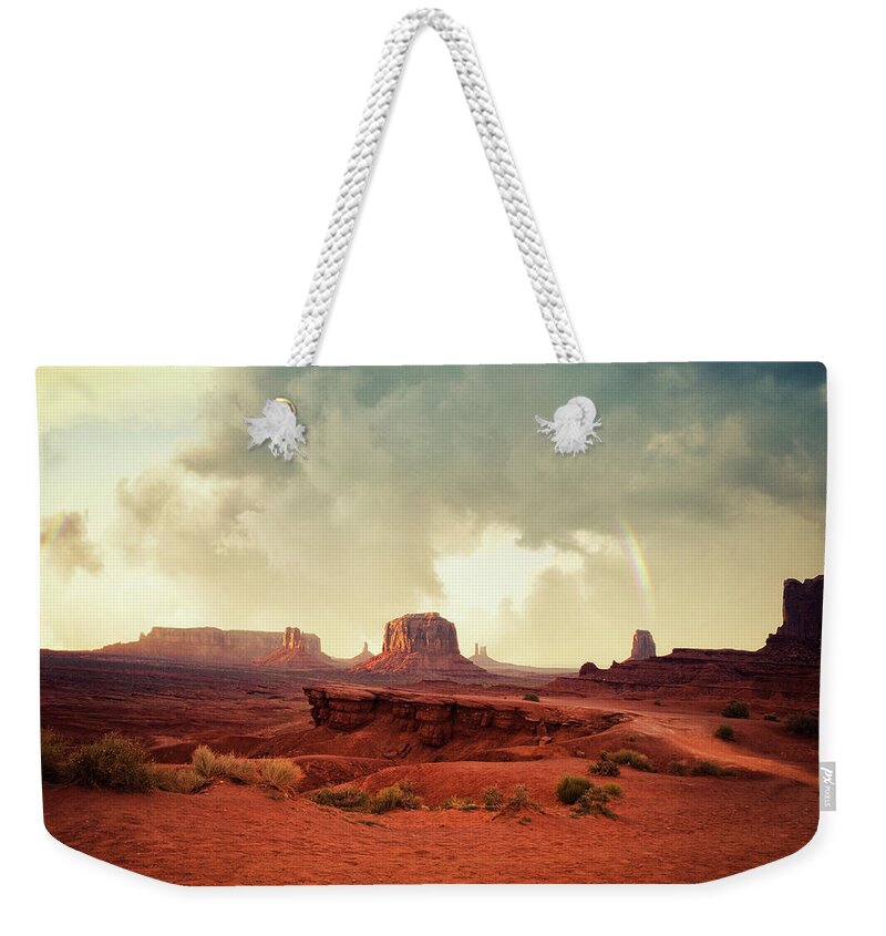 Scenics Weekender Tote Bag featuring the photograph Monument Valley At Sunset #1 by Powerofforever