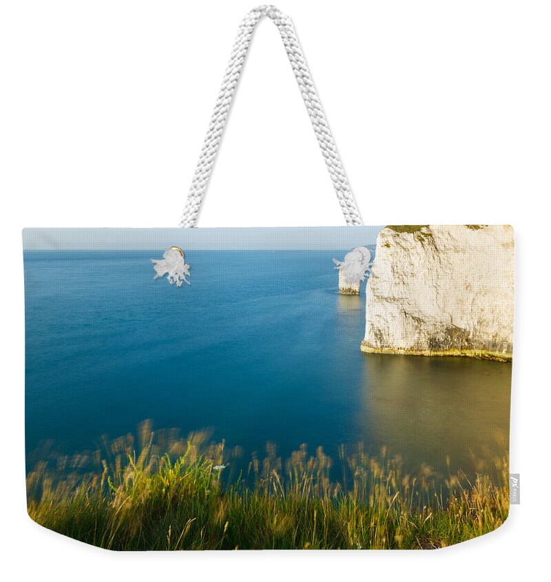 Old Harry Weekender Tote Bag featuring the photograph Morning light at Old Harry Rocks #1 by Ian Middleton