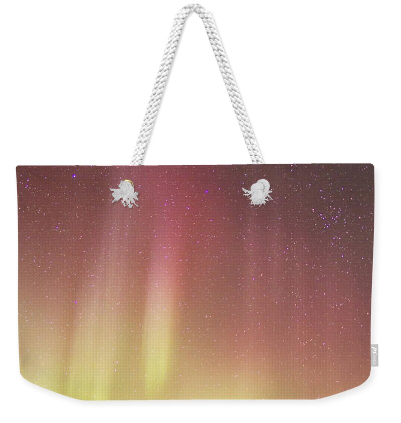 Atmospheric Mood Weekender Tote Bag featuring the photograph Red Aurora Borealis Over Carcross #1 by Joseph Bradley