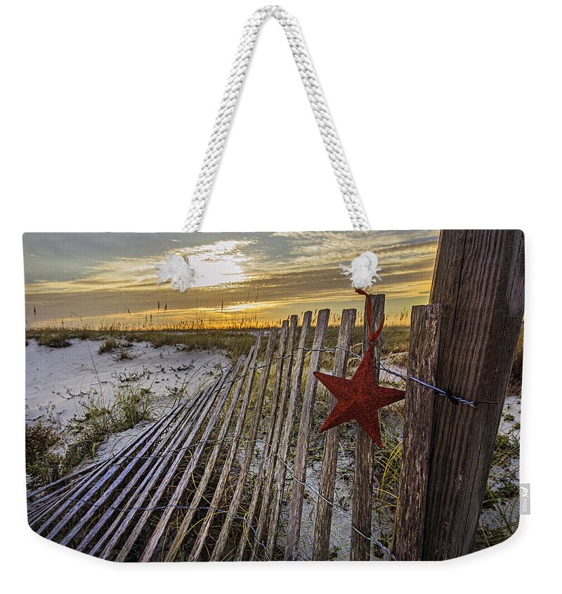 Christmas Weekender Tote Bag featuring the digital art Red Star on Fence #1 by Michael Thomas