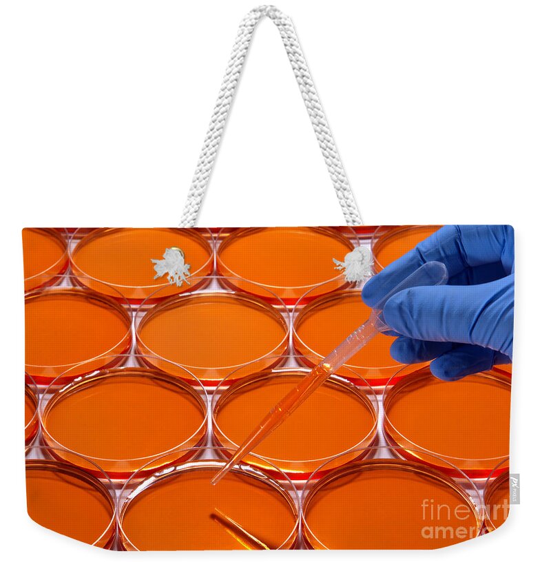 Lab Weekender Tote Bag featuring the photograph Scientific Experiment in Science Research Lab #1 by Science Research Lab
