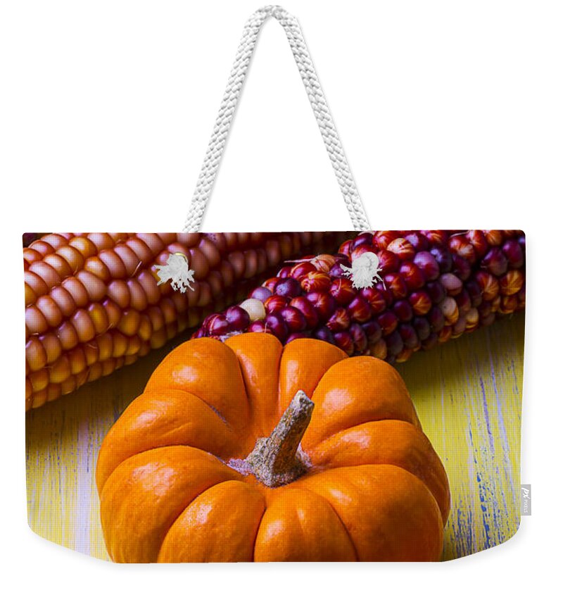 Indian Weekender Tote Bag featuring the photograph Small pumpkin and Indian corn #2 by Garry Gay