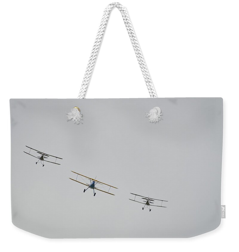 Fighers Weekender Tote Bag featuring the photograph Flight by Pablo Lopez