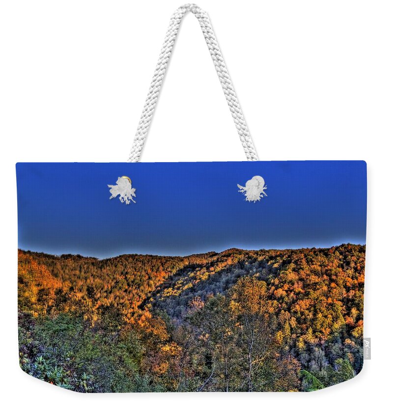 River Weekender Tote Bag featuring the photograph Sun on the Hills #1 by Jonny D