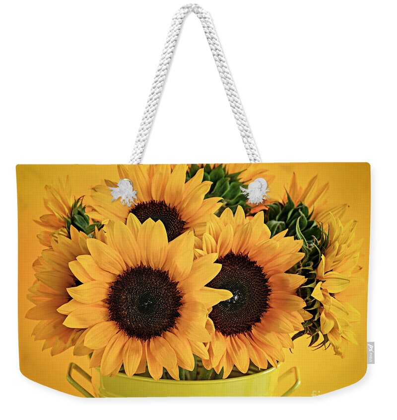Vase Weekender Tote Bag featuring the photograph Sunflowers in vase 1 by Elena Elisseeva