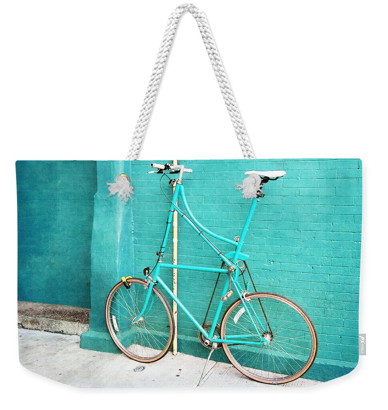 Turquoise Weekender Tote Bag featuring the photograph Tall Bike on Aqua Blue Green by Brooke T Ryan