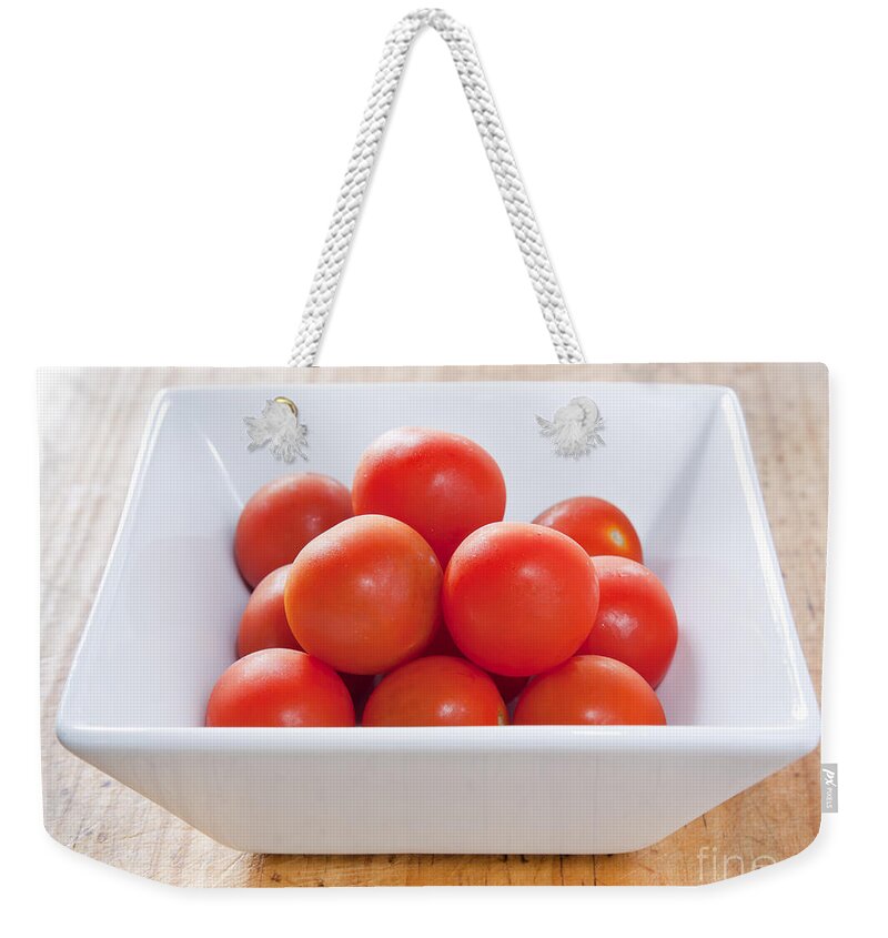 Tomatoe Weekender Tote Bag featuring the photograph Tomatoes #1 by THP Creative