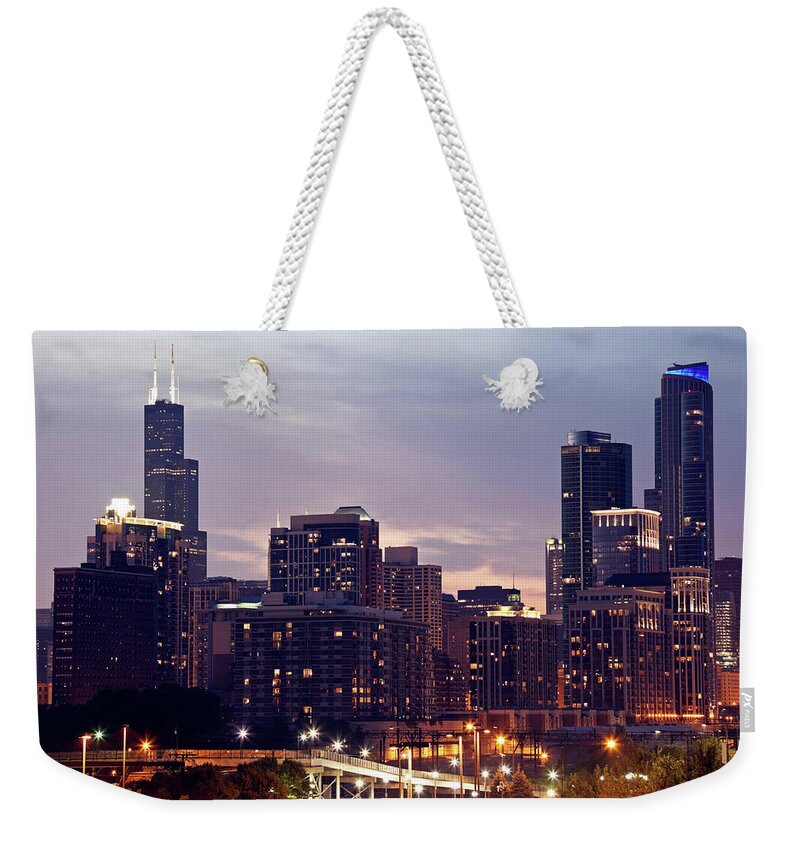 Downtown District Weekender Tote Bag featuring the photograph Usa, Illinois, Chicago Skyline At Dusk #1 by Henryk Sadura
