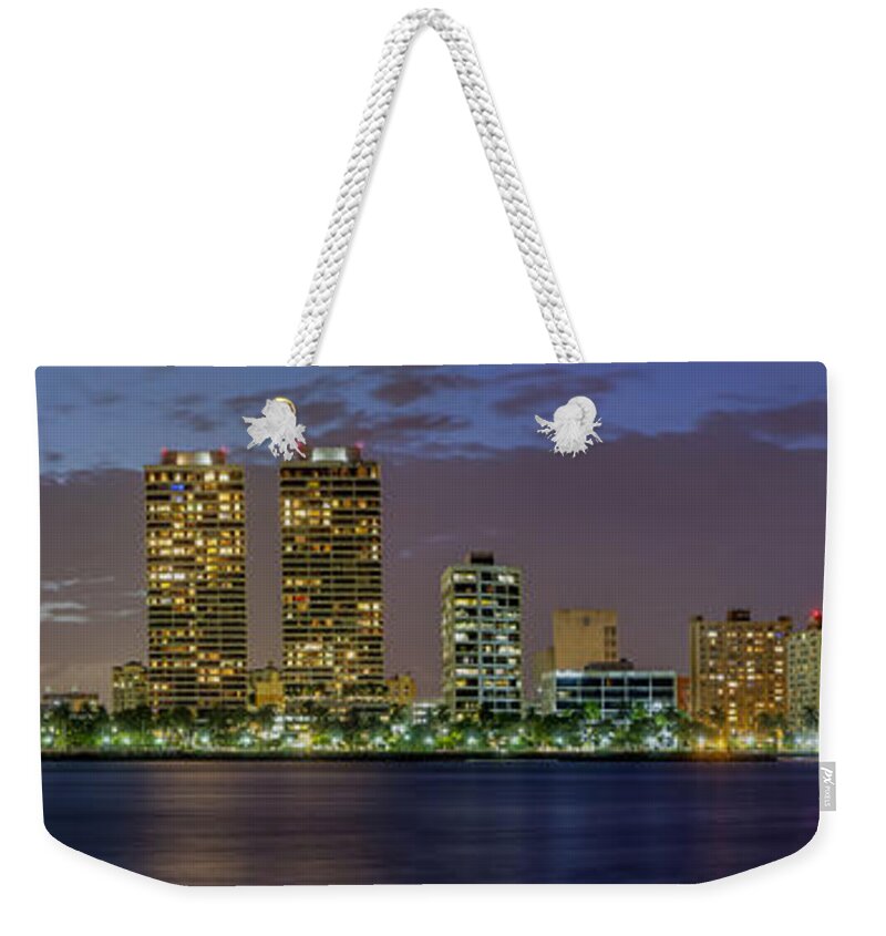 At Weekender Tote Bag featuring the photograph West Palm Beach at Night #2 by Debra and Dave Vanderlaan