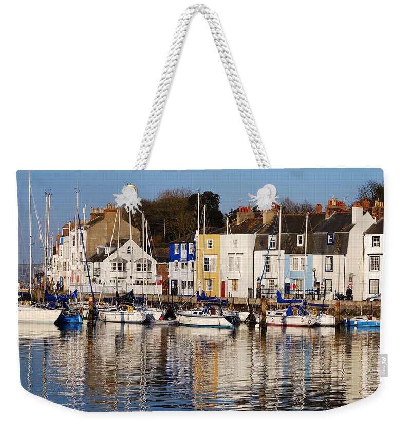 Weymouth Weekender Tote Bag featuring the photograph Weymouth In The Water by Wendy Wilton