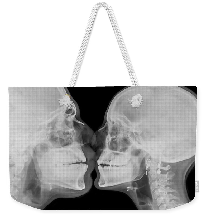 Bizarre Weekender Tote Bag featuring the photograph X-ray kissing #1 by Guy Viner