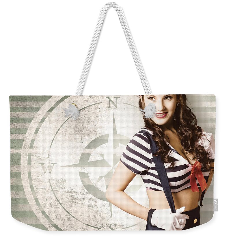 Yachting Weekender Tote Bag featuring the photograph Young sailor pin up girl on travel cruise compass #1 by Jorgo Photography