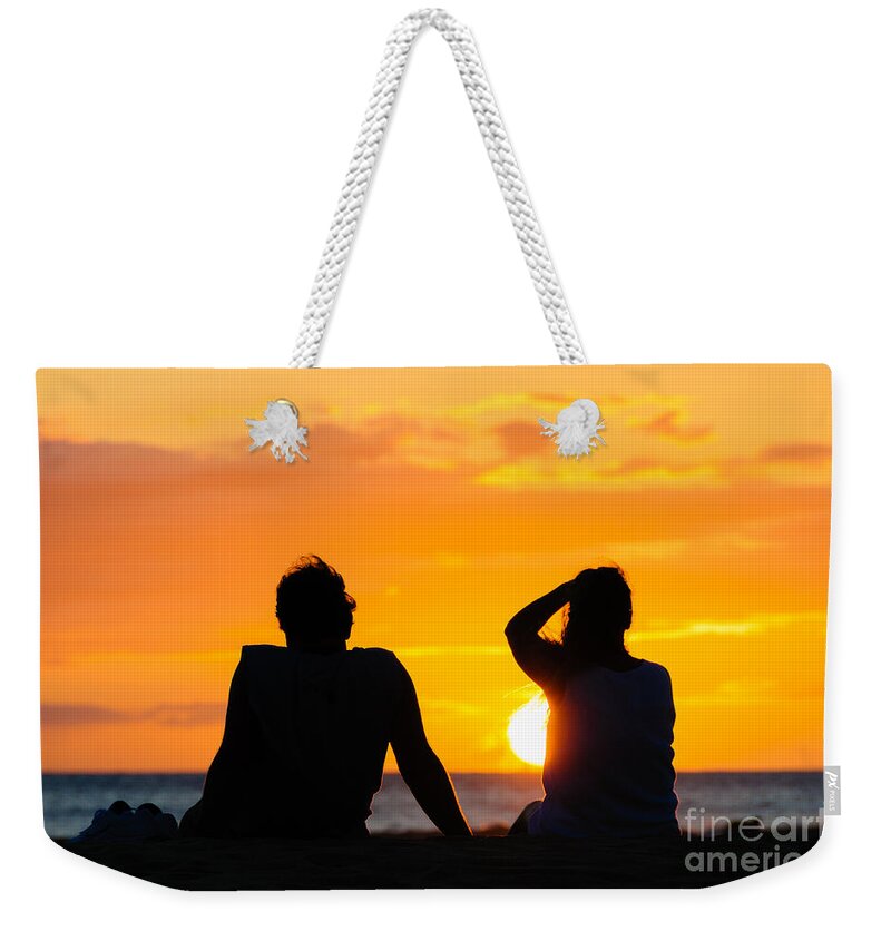 Hawaii Weekender Tote Bag featuring the photograph Couple watching the sunset on a beach in Maui Hawaii USA #10 by Don Landwehrle