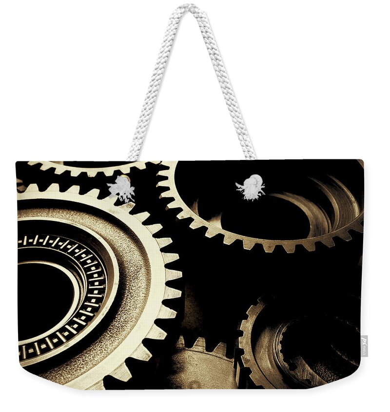 Gearing Weekender Tote Bag featuring the photograph Cogs No1 by Les Cunliffe