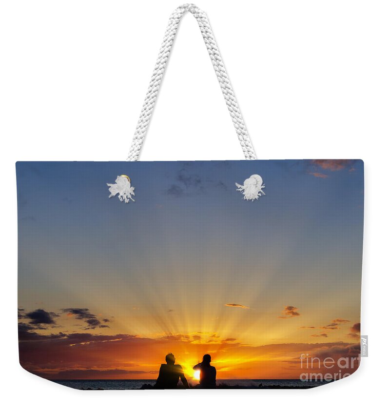 Hawaii Weekender Tote Bag featuring the photograph Couple watching the sunset on a beach in Maui Hawaii USA #12 by Don Landwehrle
