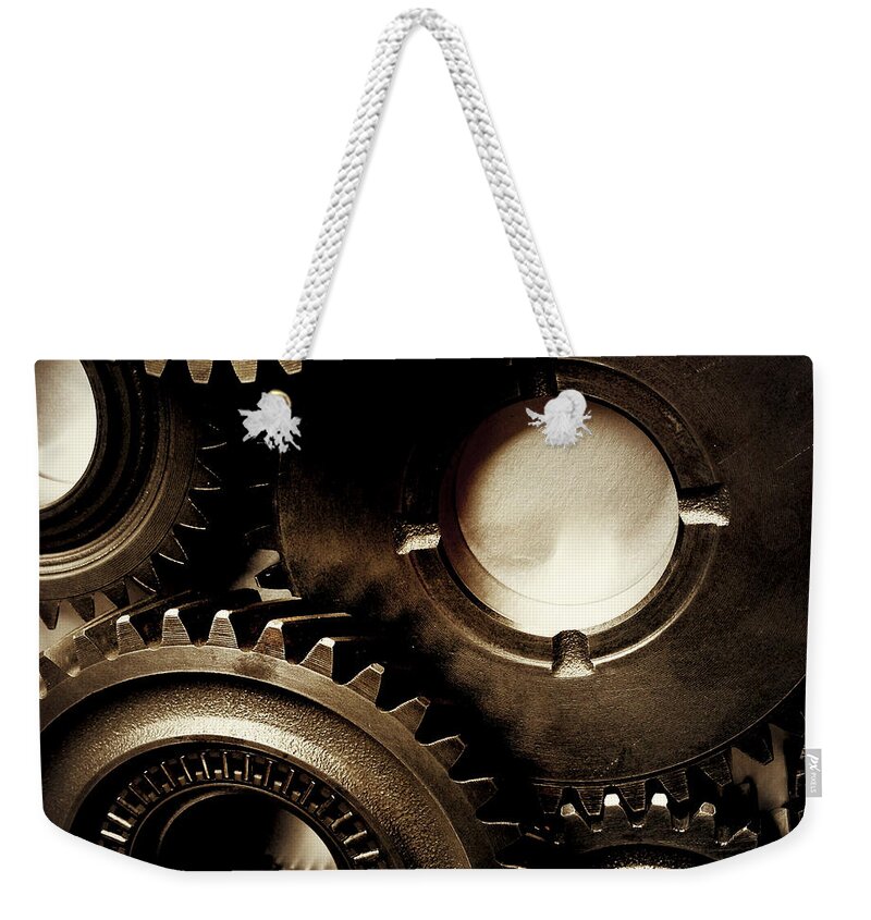 Gearing Weekender Tote Bag featuring the photograph Cogs No3 by Les Cunliffe