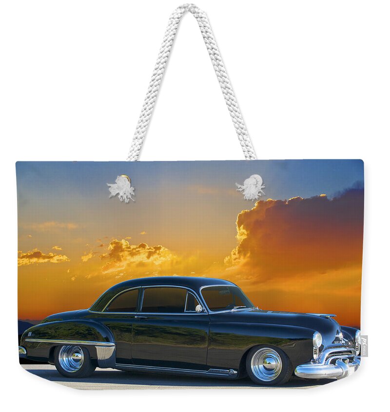 Auto Weekender Tote Bag featuring the photograph 1950 Oldsmobile Coupe by Dave Koontz