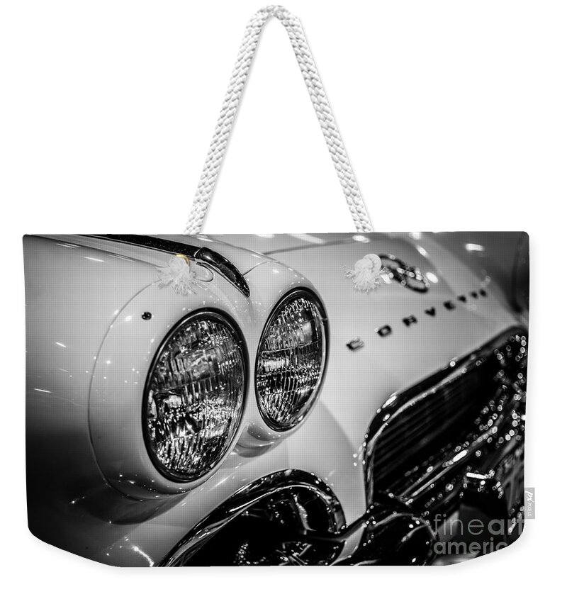 1950's Weekender Tote Bag featuring the photograph 1950's Chevrolet Corvette C1 in Black and White by Paul Velgos
