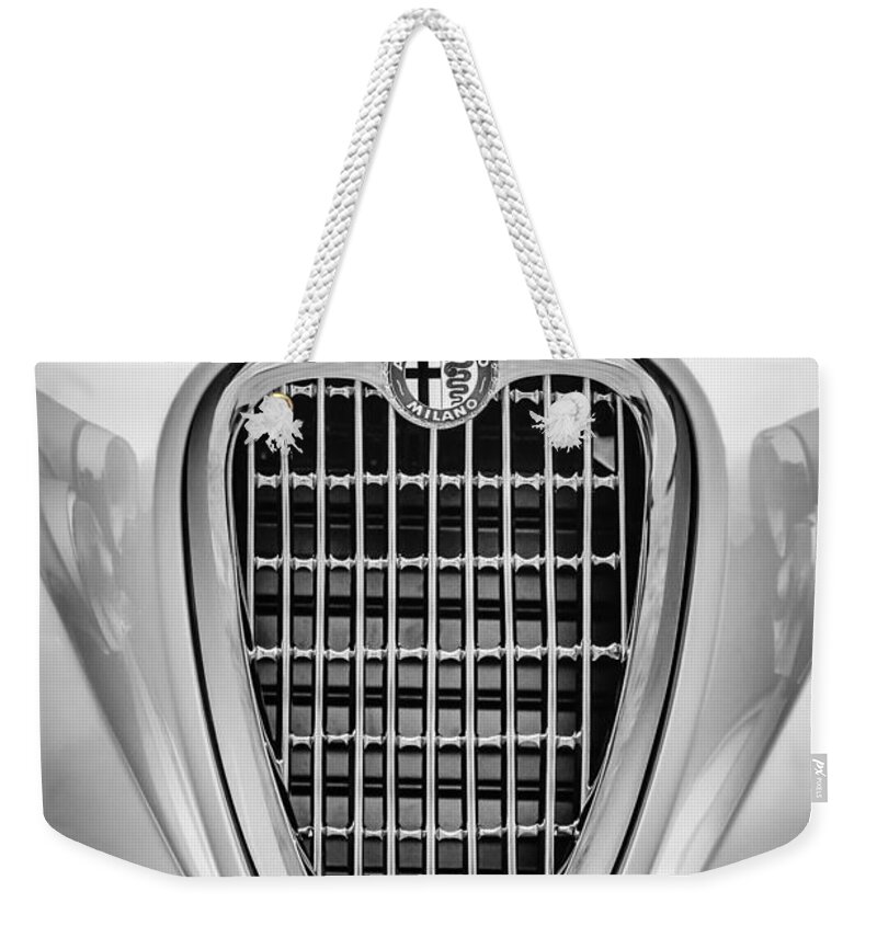 1955 Alfa Romeo 1900 Css Ghia Aigle Cabriolet Grille Emblem Weekender Tote Bag featuring the photograph 1955 Alfa Romeo 1900 CSS Ghia Aigle Cabriolet Grille Emblem -0564bw by Jill Reger