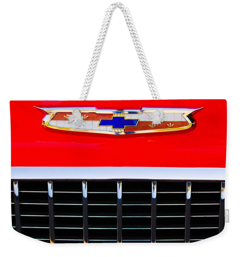1955 Chevrolet Nomad Weekender Tote Bag featuring the photograph 1955 Chevrolet Nomad Emblem by Jill Reger
