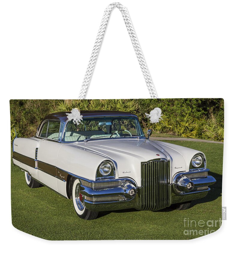 1955 Packard Request Weekender Tote Bag featuring the photograph 1955 Packard Request by Dennis Hedberg