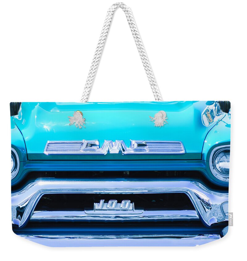 1958 Gmc Series 101-s Pickup Truck Grille Emblem Weekender Tote Bag featuring the photograph 1958 GMC Series 101-S Pickup Truck Grille Emblem by Jill Reger