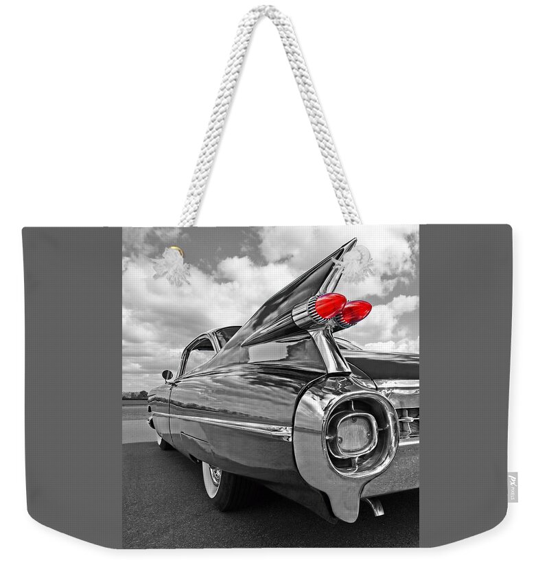 Cadillac Weekender Tote Bag featuring the photograph 1959 Cadillac Tail Fins by Gill Billington