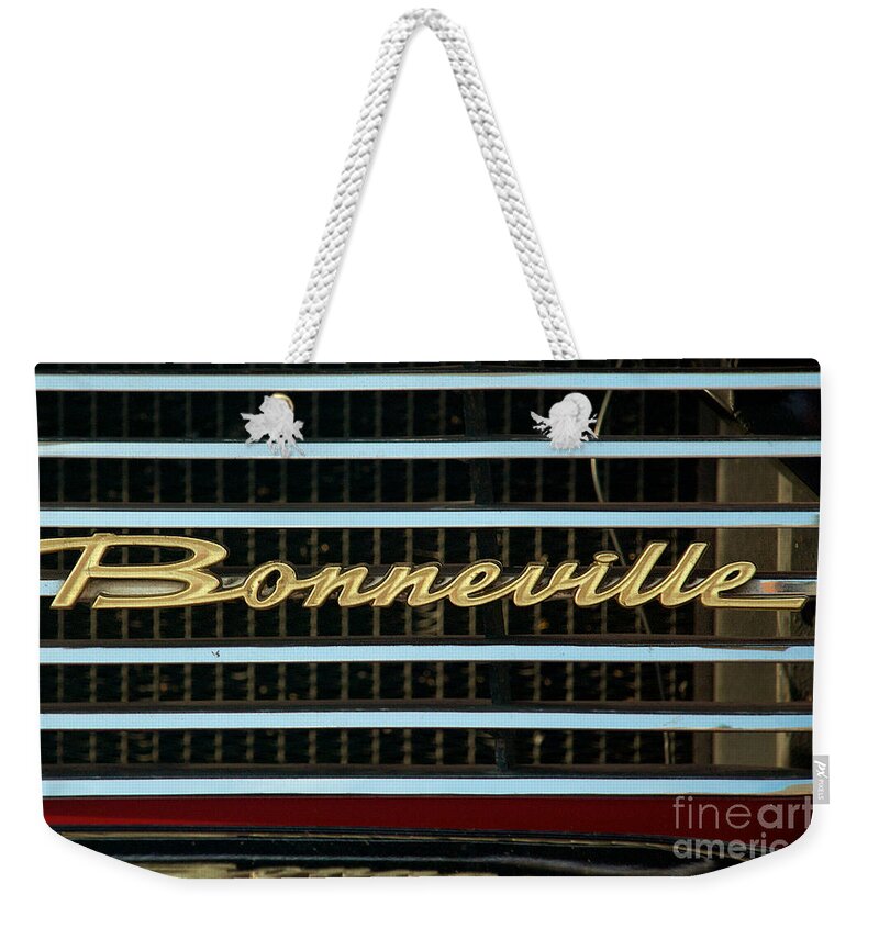 4th Annual Weekender Tote Bag featuring the photograph 1960 Pontiac Belvedere Logo by Mark Dodd