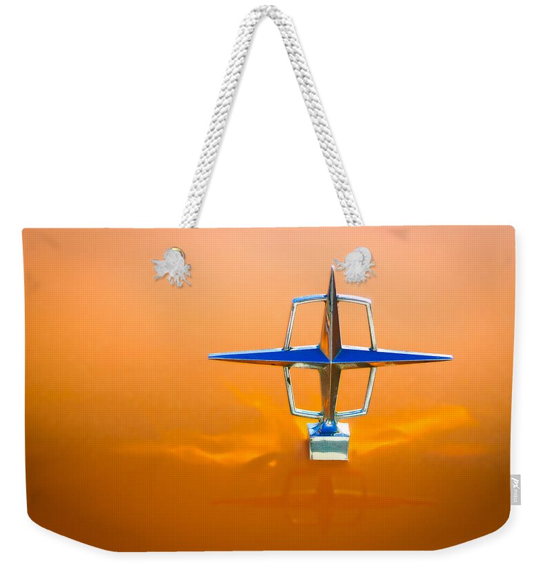 1963 Lincoln Continental Hood Ornament Weekender Tote Bag featuring the photograph 1963 Lincoln Continental Hood Ornament by Jill Reger