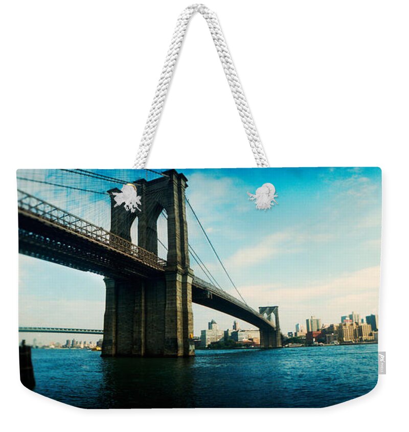 Photography Weekender Tote Bag featuring the photograph Bridge Across A River, Brooklyn Bridge #2 by Panoramic Images