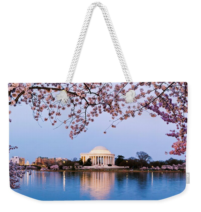 Photography Weekender Tote Bag featuring the photograph Cherry Blossom Tree With A Memorial #2 by Panoramic Images