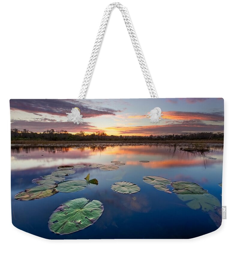 Clouds Weekender Tote Bag featuring the photograph Everglades at Sunset by Debra and Dave Vanderlaan