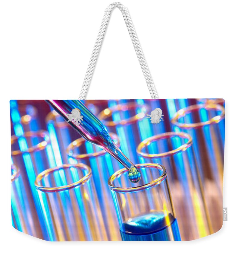 Test Weekender Tote Bag featuring the photograph Laboratory Experiment in Science Research Lab #2 by Science Research Lab
