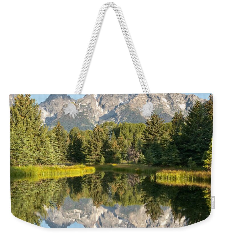 Awe Weekender Tote Bag featuring the photograph Teton Range Reflected in the Snake River by Jeff Goulden