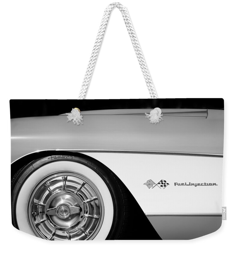 1957 Chevrolet Corvette Wheel Emblem Weekender Tote Bag featuring the photograph 1957 Chevrolet Corvette Wheel Emblem #3 by Jill Reger