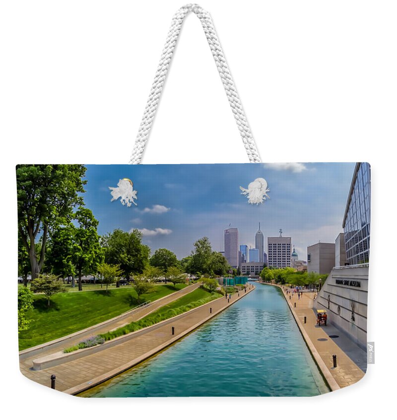 Indiana Weekender Tote Bag featuring the photograph Indianapolis Skyline from the Canal by Ron Pate