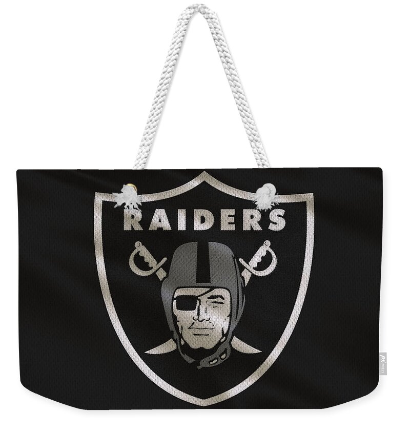 Raiders Weekender Tote Bag featuring the photograph Oakland Raiders Uniform by Joe Hamilton