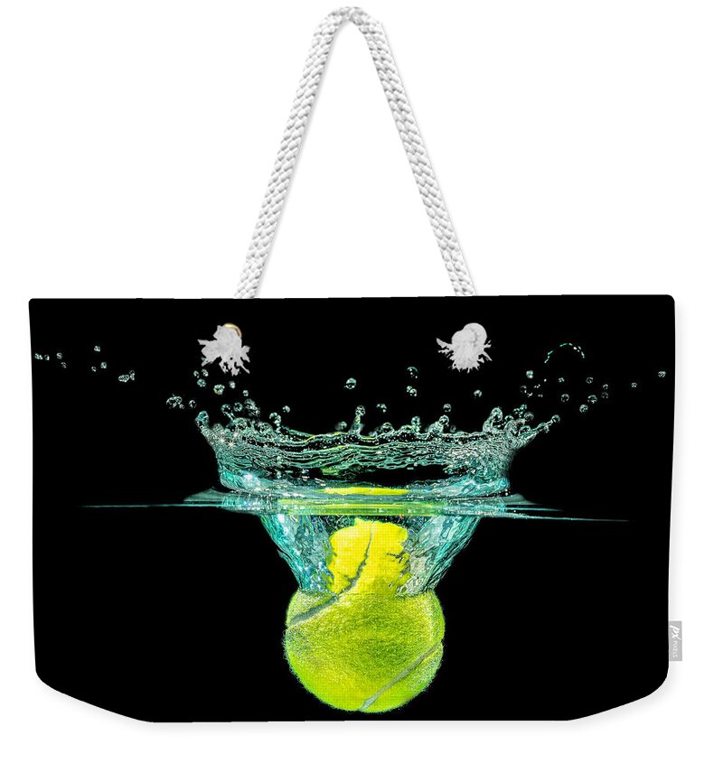 Activity Weekender Tote Bag featuring the photograph Tennis Ball by Peter Lakomy