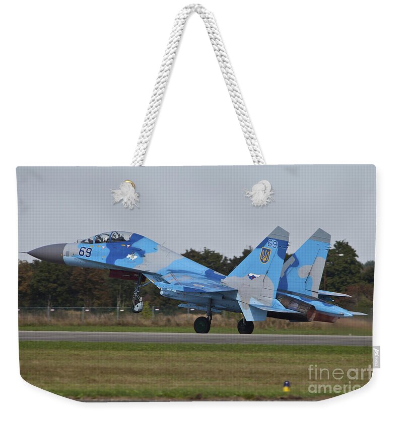 Czech Republic Weekender Tote Bag featuring the photograph Ukrainian Air Force Su-27 Flanker #4 by Timm Ziegenthaler