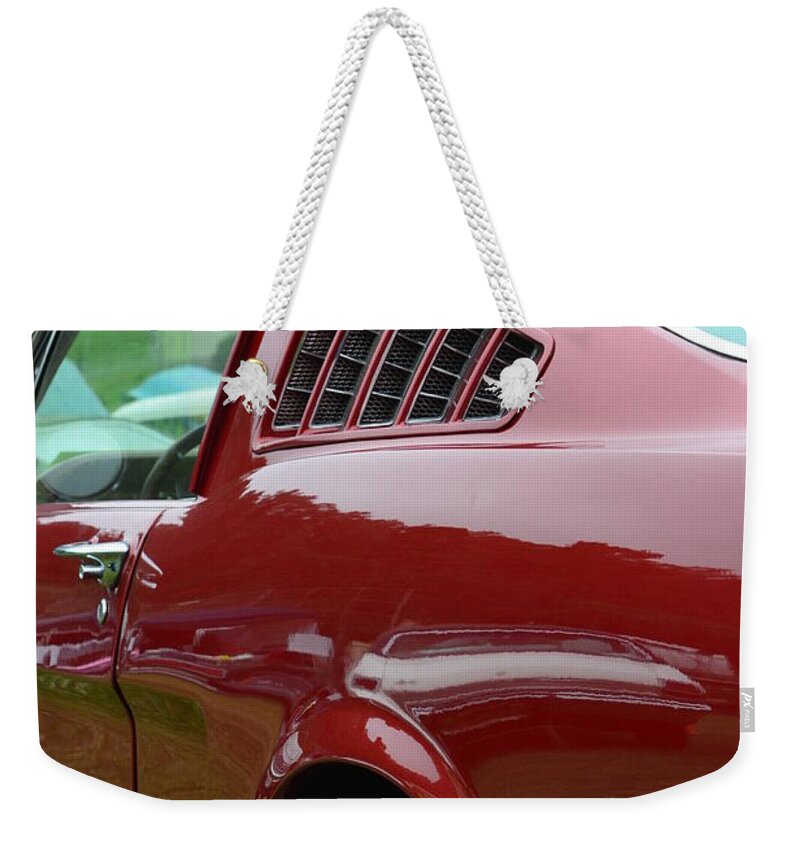 Red Weekender Tote Bag featuring the photograph Classic Mustang by Dean Ferreira