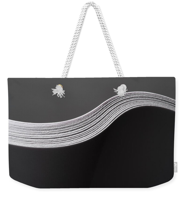Simplicity Weekender Tote Bag featuring the photograph Close Up Detail Of Multiple Sheets Of #5 by Pm Images