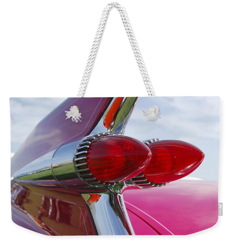 Transportation Weekender Tote Bag featuring the photograph 1959 Cadillac Eldorado Taillight #6 by Jill Reger