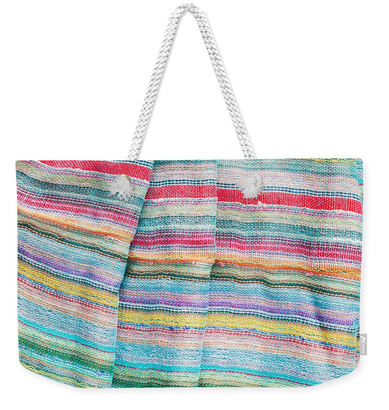 Backdrop Weekender Tote Bag featuring the photograph Colorful cloth #6 by Tom Gowanlock
