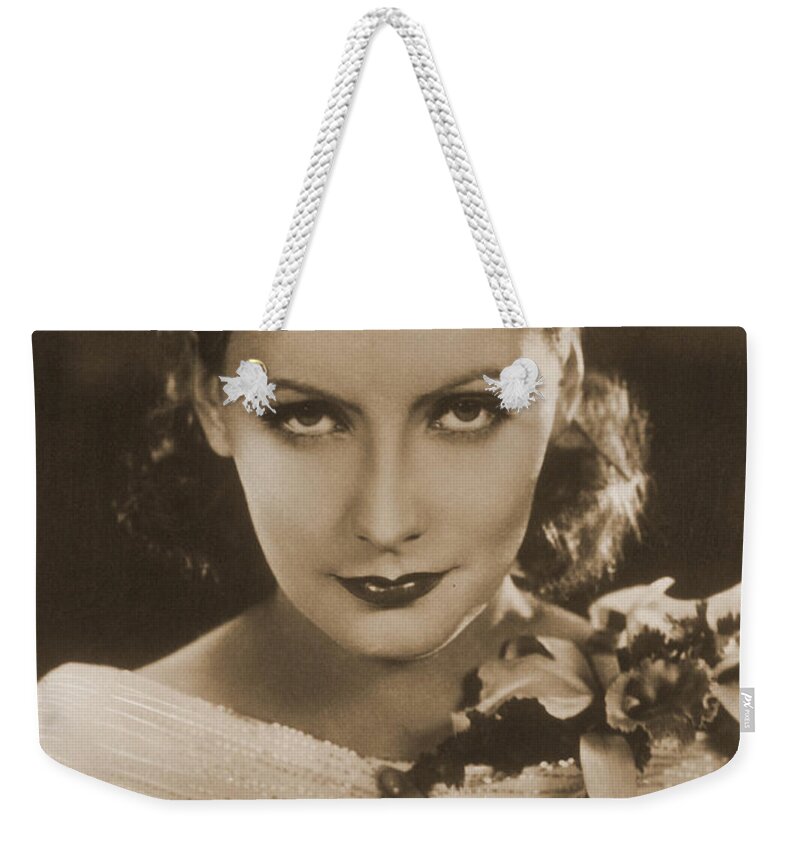 Entertainment Weekender Tote Bag featuring the photograph Greta Garbo, Hollywood Movie Star #1 by Photo Researchers