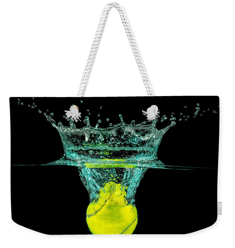 Activity Weekender Tote Bag featuring the photograph Tennis Ball by Peter Lakomy